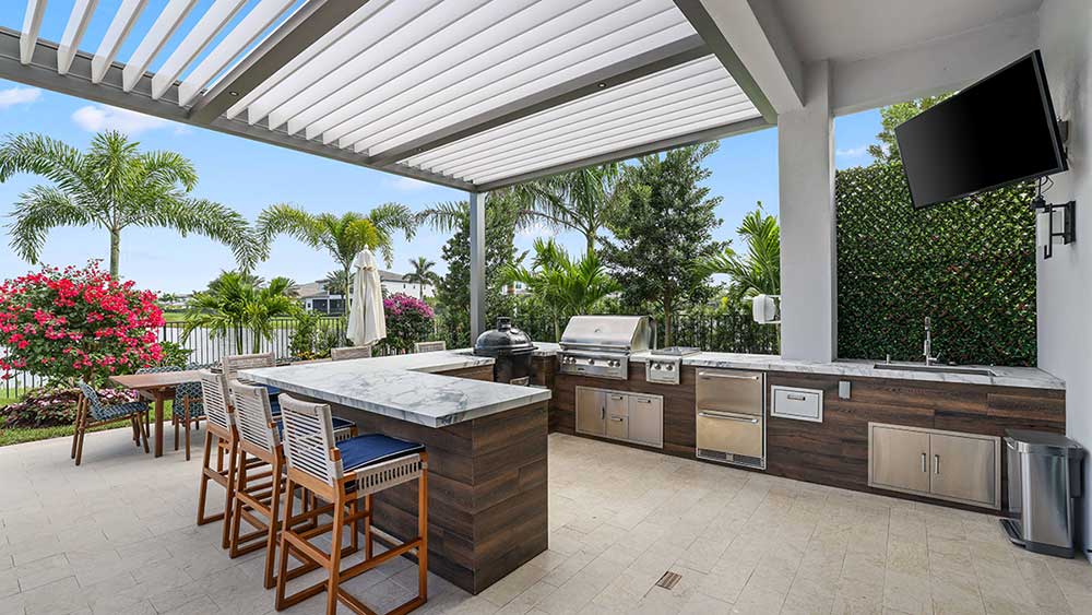 Azenco Outdoor that open and close in Plam Beach, FL - Model R-Blade pergola in grey bronze with white louvers